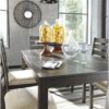 Signature Design by Ashley Rokane 20" Dining Room Table Set with 6 Upholstered Chairs, Brown