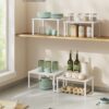 SONGMICS Cabinet Organizer Shelf, Set of 2 Kitchen Counter Shelves, Kitchen Storage, Spice Rack, Stackable, Expandable, Metal and Engineered Wood, Cloud White and Snow White UKCS02W01
